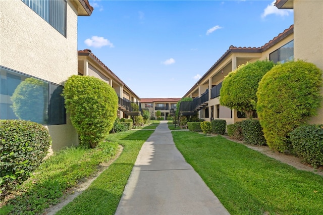 43195 Andrade Ave Unit L, Hemet, CA 92544 - view of community with a yard and a residential view
