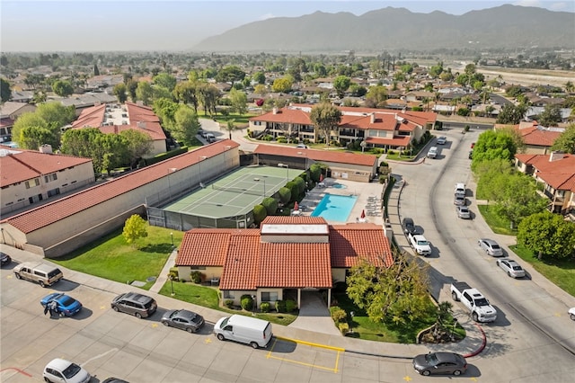 43195 Andrade Ave Unit L, Hemet, CA 92544 - aerial perspective of suburban area featuring a mountain backdrop and a pool area