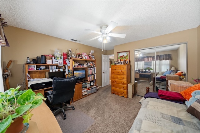 43195 Andrade Ave Unit L, Hemet, CA 92544 - carpeted home office featuring a ceiling fan and a textured ceiling