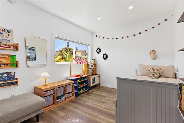 1156 W 26th St, San Pedro, CA 90731 - bedroom featuring light wood-type flooring and recessed lighting