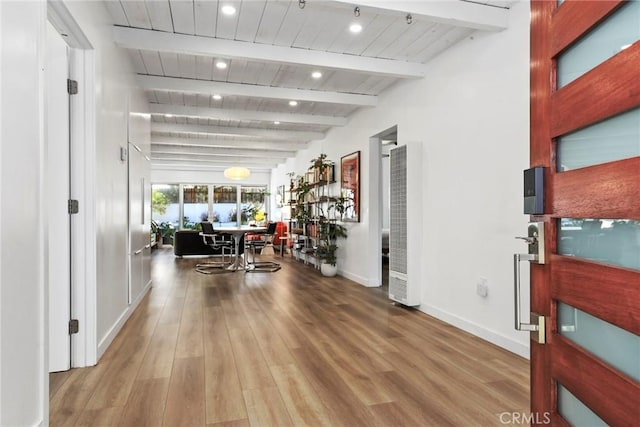 1156 W 26th St, San Pedro, CA 90731 - foyer entrance with wood ceiling with exposed beams, wood finished floors, a heating unit, baseboards, and recessed lighting