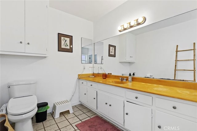 1156 W 26th St, San Pedro, CA 90731 - bathroom with vanity, toilet, and tile patterned flooring