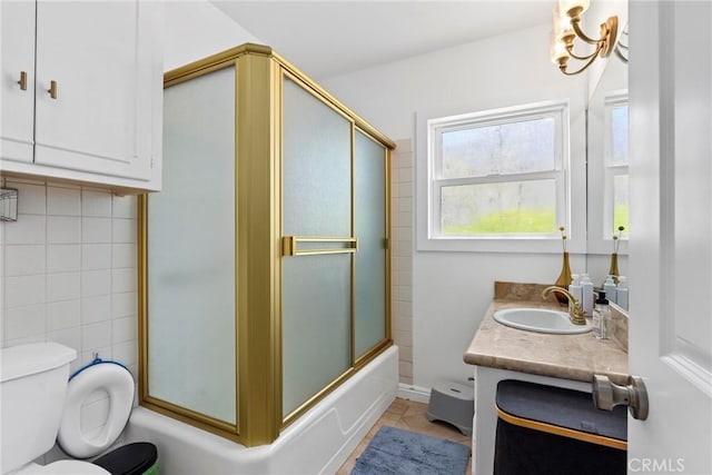 1156 W 26th St, San Pedro, CA 90731 - full bathroom with vanity, toilet, bath / shower combo with glass door, and tile patterned flooring