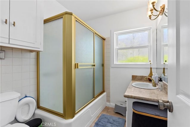 1156 W 26th St, San Pedro, CA 90731 - bathroom featuring vanity, tile patterned flooring, and bath / shower combo with glass door
