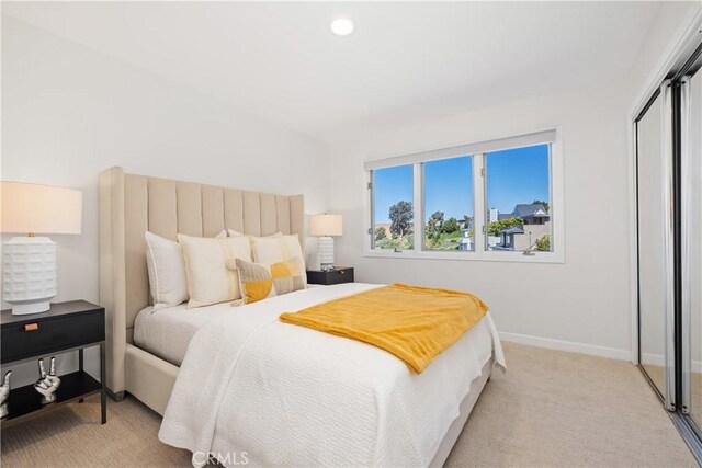 901 Summit Dr, Laguna Beach, CA 92651 - bedroom with baseboards, light colored carpet, a closet, and recessed lighting