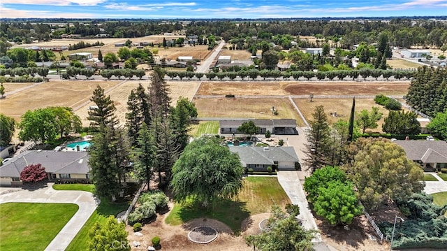 9331 E Mesa Ave, Clovis, CA 93619 - drone / aerial view of a pool and a tree filled landscape