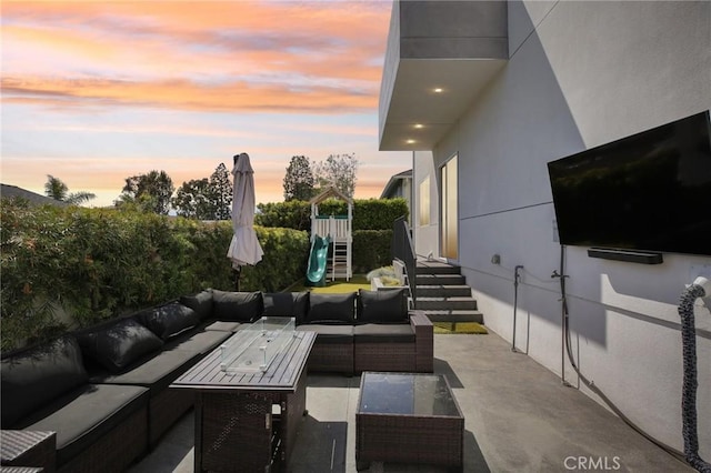 1926 Ruhland Ave Unit B, Redondo Beach, CA 90278 - patio terrace at dusk featuring outdoor lounge area, a playground, and a patio area