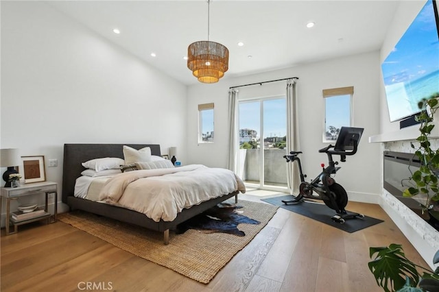 1926 Ruhland Ave Unit B, Redondo Beach, CA 90278 - bedroom featuring access to exterior, multiple windows, wood finished floors, and recessed lighting