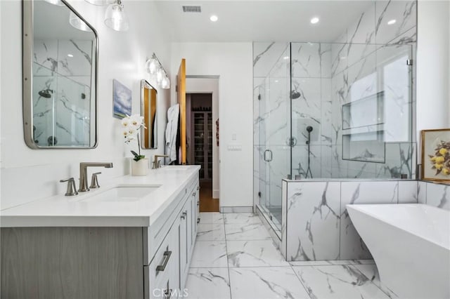 1926 Ruhland Ave Unit B, Redondo Beach, CA 90278 - full bathroom featuring a marble finish shower, marble look tiles, double vanity, a soaking tub, and recessed lighting