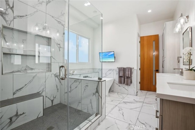 1926 Ruhland Ave Unit B, Redondo Beach, CA 90278 - bathroom featuring marble finish flooring, a soaking tub, double vanity, a marble finish shower, and recessed lighting