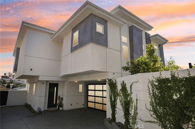 1926 Ruhland Ave Unit B, Redondo Beach, CA 90278 - view of property exterior featuring an attached garage and stucco siding