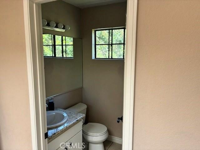 2249 Montrose Ave Unit 7, Montrose, CA 91020 - bathroom with vanity, toilet, tile patterned floors, and baseboards