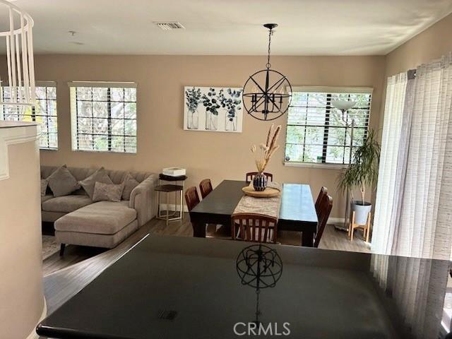 2249 Montrose Ave Unit 7, Montrose, CA 91020 - dining space with wood finished floors and baseboards