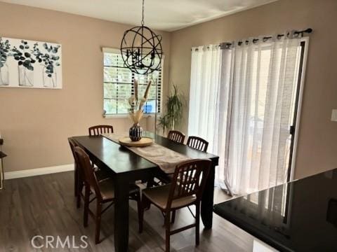 2249 Montrose Ave Unit 7, Montrose, CA 91020 - dining space featuring a chandelier, dark wood-style floors, and baseboards