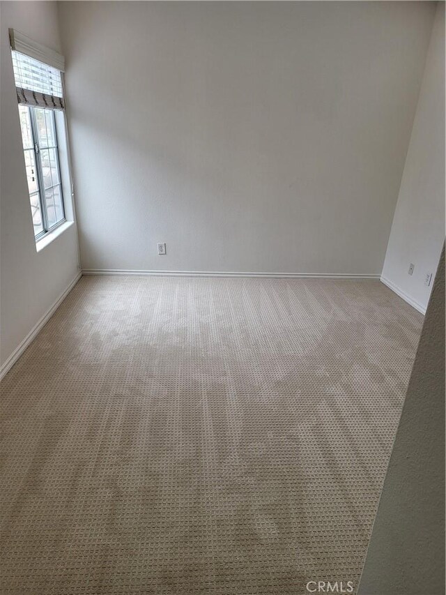 23 Gauguin Cir, Aliso Viejo, CA 92656 - carpeted spare room featuring baseboards