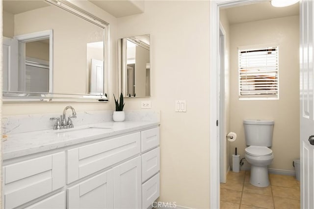 31291 Via Fajita, San Juan Capistrano, CA 92675 - full bathroom featuring vanity, toilet, baseboards, and tile patterned floors