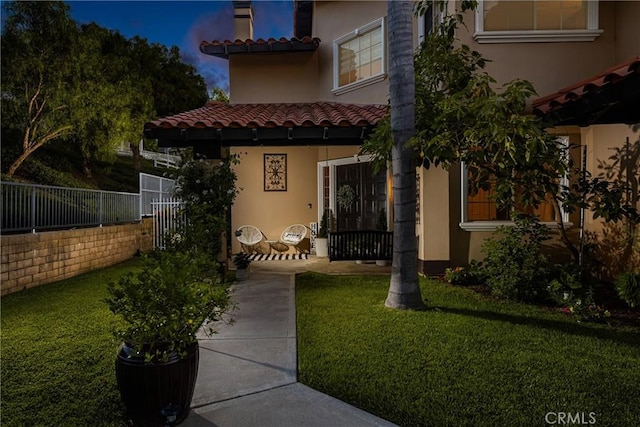31291 Via Fajita, San Juan Capistrano, CA 92675 - property entrance with a tile roof and stucco siding