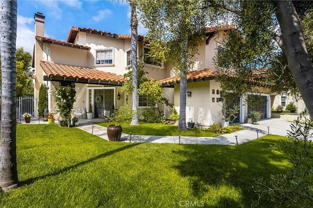 31291 Via Fajita, San Juan Capistrano, CA 92675 - back of property with a tiled roof, stucco siding, and a garage