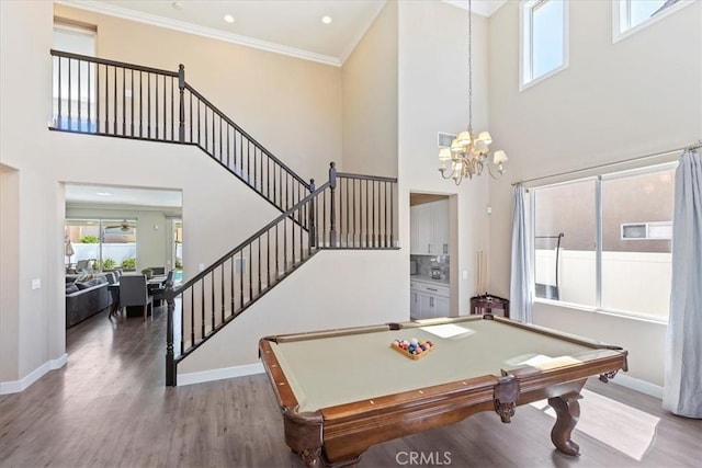 26273 Palm Tree Ln, Murrieta, CA 92563 - playroom with a towering ceiling, wood finished floors, baseboards, plenty of natural light, and billiards