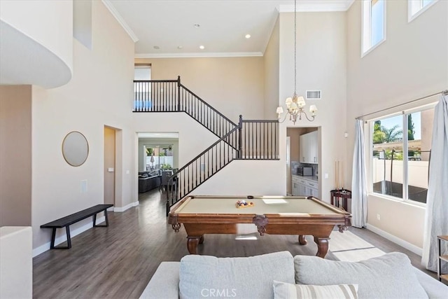 26273 Palm Tree Ln, Murrieta, CA 92563 - game room with a high ceiling, wood finished floors, billiards table, baseboards, and a chandelier