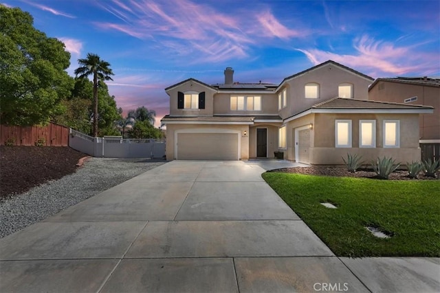 26273 Palm Tree Ln, Murrieta, CA 92563 - traditional home featuring stucco siding, solar panels, an attached garage, and concrete driveway