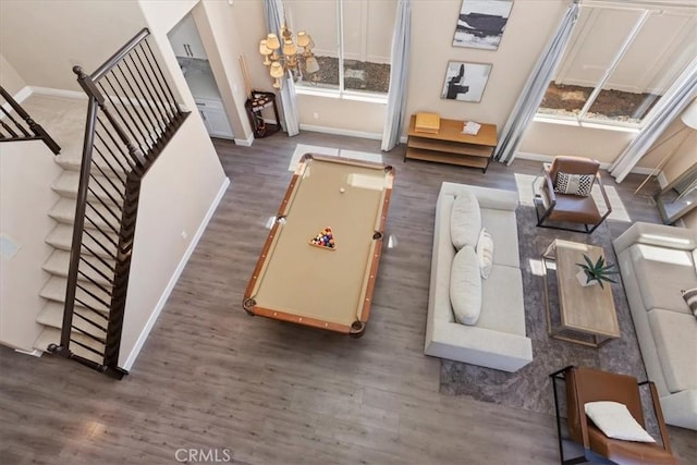 26273 Palm Tree Ln, Murrieta, CA 92563 - living room with wood finished floors, a chandelier, and stairs