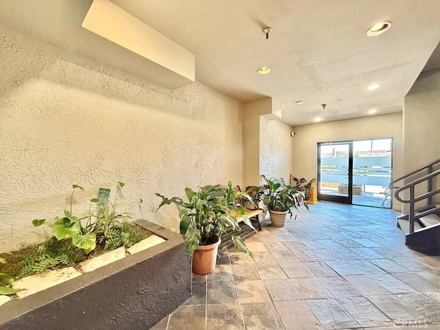 4142 E Mendez St Unit 132, Long Beach, CA 90815 - community lobby with a textured wall and recessed lighting