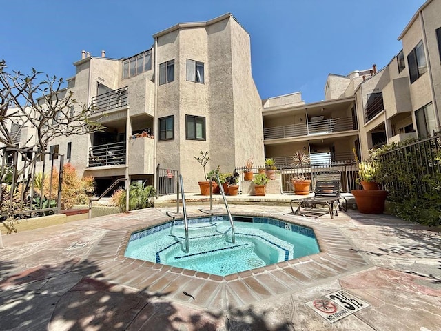 4142 E Mendez St Unit 132, Long Beach, CA 90815 - view of swimming pool with a community hot tub and a swimming pool