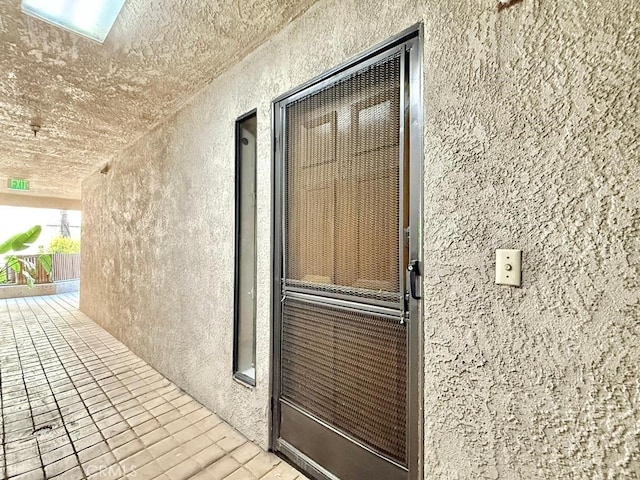 4142 E Mendez St Unit 132, Long Beach, CA 90815 - property entrance with stucco siding