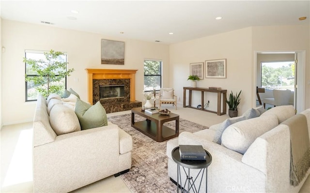 570 Jenny Pl, Arroyo Grande, CA 93420 - living room with plenty of natural light, a high end fireplace, and recessed lighting