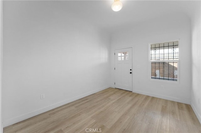 752 E 17th St, Los Angeles, CA 90021 - entrance foyer with light wood finished floors and baseboards