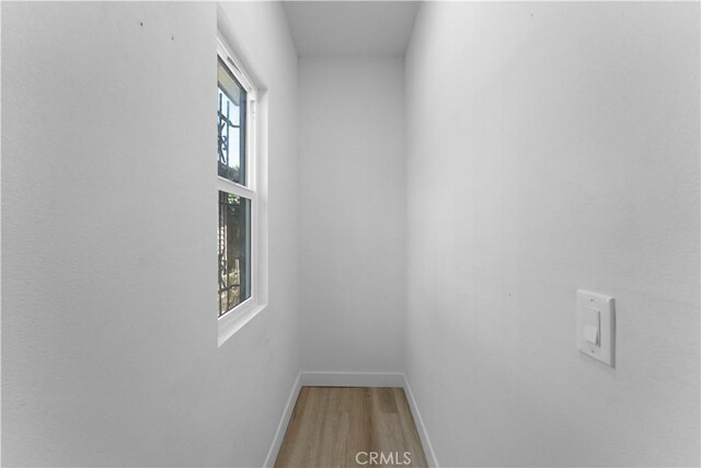 752 E 17th St, Los Angeles, CA 90021 - empty room featuring wood finished floors and baseboards