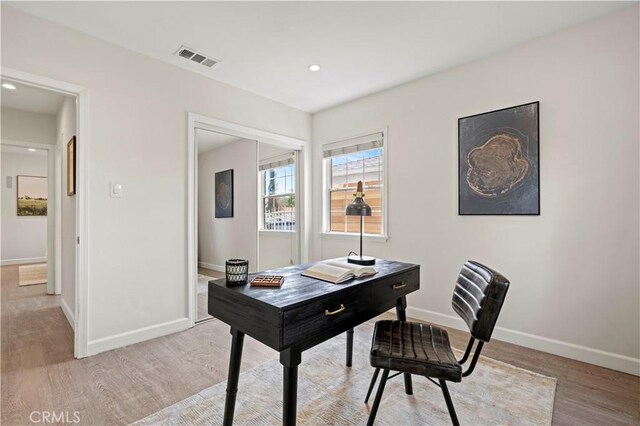 5834 Satsuma Ave, North Hollywood, CA 91601 - home office with baseboards, light wood-type flooring, and recessed lighting