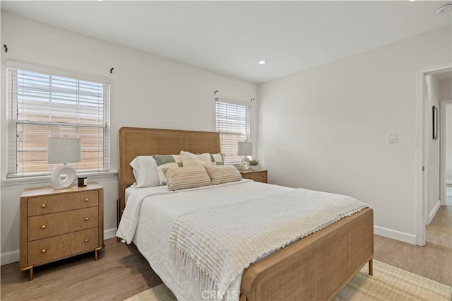 5834 Satsuma Ave, North Hollywood, CA 91601 - bedroom with light wood-style flooring, baseboards, and recessed lighting