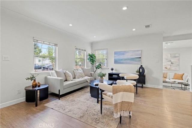 5834 Satsuma Ave, North Hollywood, CA 91601 - living area featuring light wood-type flooring, recessed lighting, and baseboards