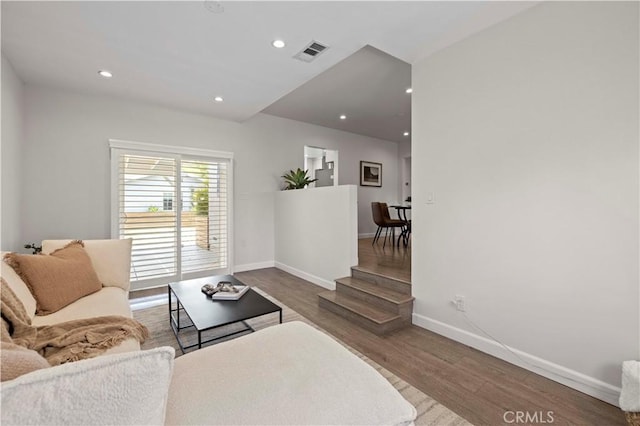 5834 Satsuma Ave, North Hollywood, CA 91601 - living room featuring wood finished floors, baseboards, and recessed lighting