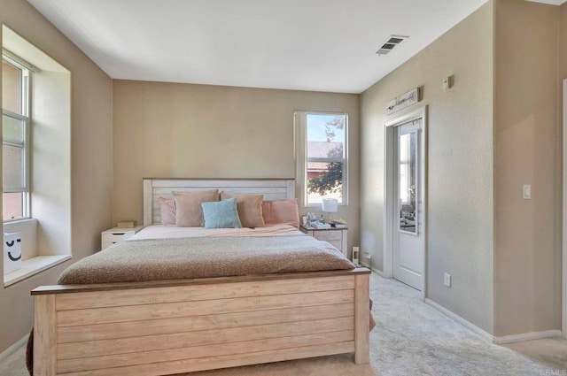 4300 Newton Ave Unit 110, San Diego, CA 92113 - bedroom featuring light carpet and baseboards