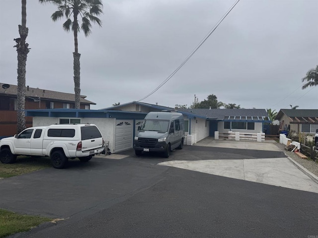 11201122 Gardena Rd, Encinitas, CA 92024 - view of front facade with asphalt driveway and an attached garage