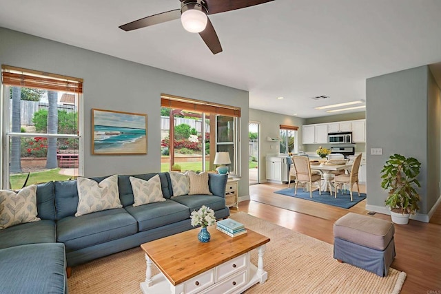 513 Shadow Tree Dr, Oceanside, CA 92058 - living area featuring light wood-type flooring, a ceiling fan, baseboards, and recessed lighting