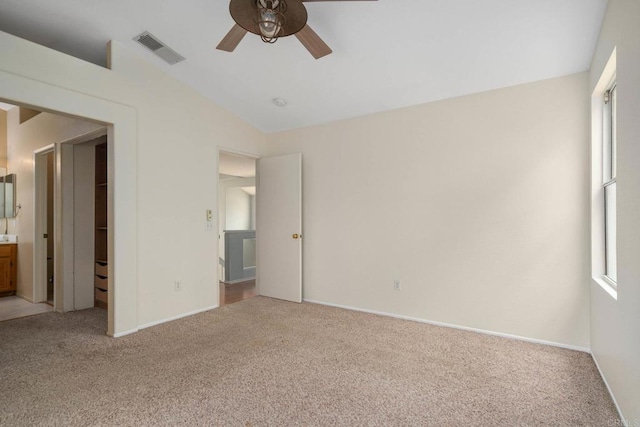 513 Shadow Tree Dr, Oceanside, CA 92058 - unfurnished bedroom featuring light colored carpet, multiple windows, and baseboards