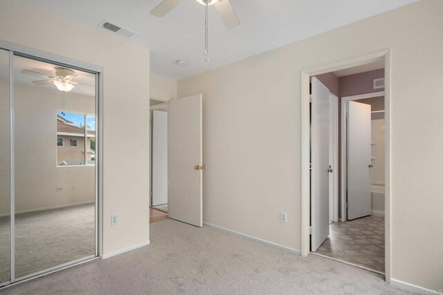 513 Shadow Tree Dr, Oceanside, CA 92058 - unfurnished bedroom with carpet, a closet, a ceiling fan, and baseboards