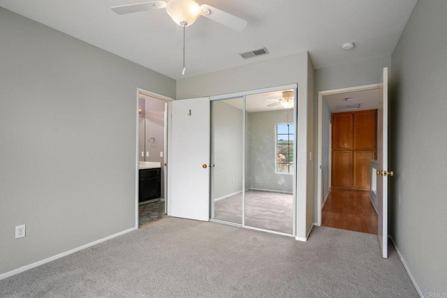 513 Shadow Tree Dr, Oceanside, CA 92058 - unfurnished bedroom featuring carpet, a closet, and baseboards