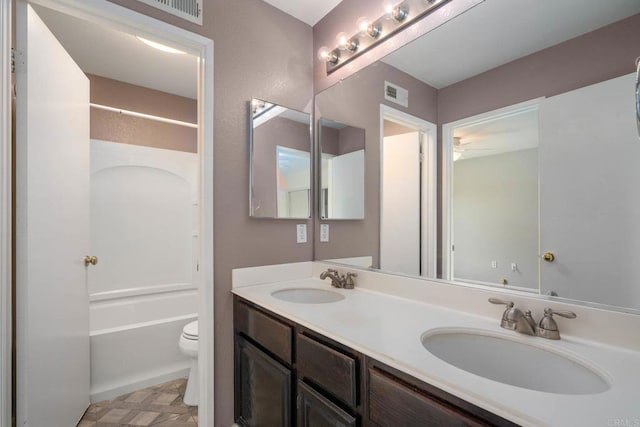 513 Shadow Tree Dr, Oceanside, CA 92058 - bathroom with toilet, double vanity, washtub / shower combination, a ceiling fan, and tile patterned floors
