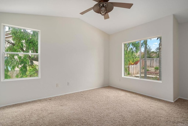 513 Shadow Tree Dr, Oceanside, CA 92058 - carpeted spare room featuring healthy amount of natural light, lofted ceiling, ceiling fan, and baseboards