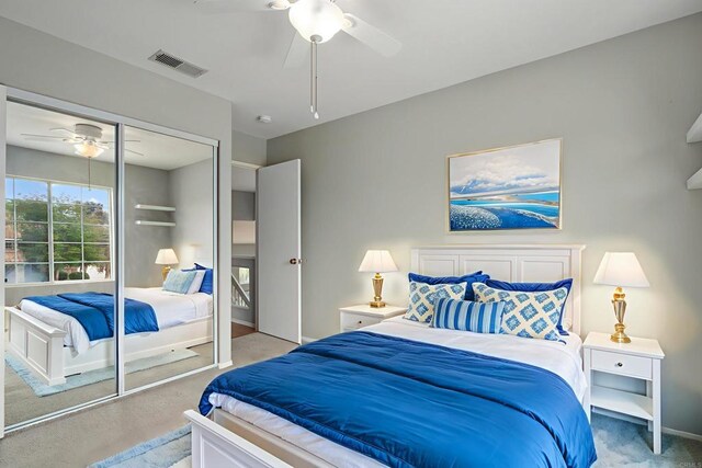 513 Shadow Tree Dr, Oceanside, CA 92058 - bedroom with light colored carpet, a closet, and a ceiling fan