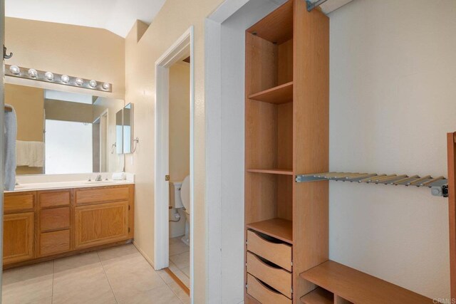 513 Shadow Tree Dr, Oceanside, CA 92058 - bathroom with toilet, vanity, and tile patterned flooring