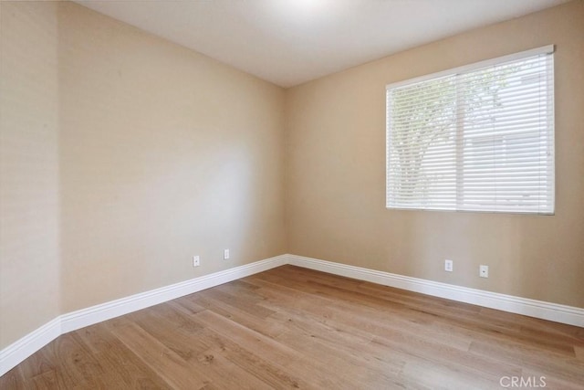 4224 Oliphant Ct, Riverside, CA 92505 - empty room with wood finished floors and baseboards