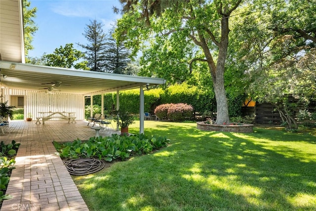 1671 Plumas Way, Chico, CA 95926 - view of green lawn with a ceiling fan and a patio