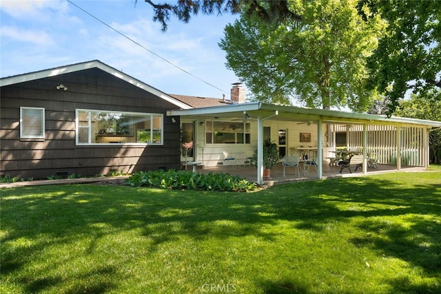 1671 Plumas Way, Chico, CA 95926 - view of front of property featuring a chimney, a patio, a front lawn, and ceiling fan
