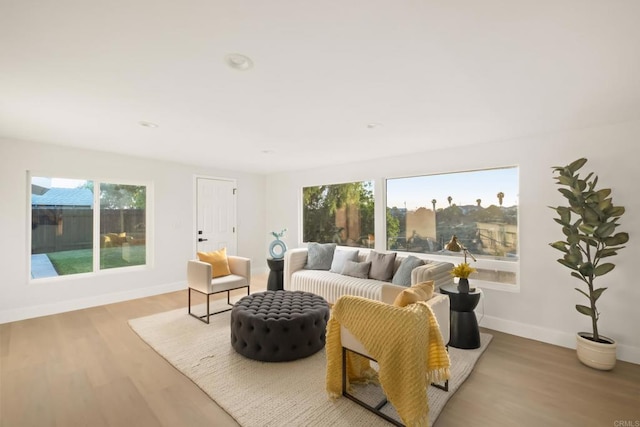 4158 Seri St, San Diego, CA 92117 - living room with healthy amount of natural light, wood finished floors, and baseboards